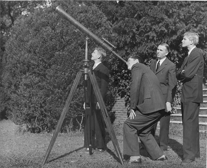 Students and science master Otto Rosner used a Ramsden telescope to see the stars from the Bowl in the 1930s.