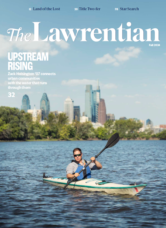 Cover of the Fall 2024 Lawrentian, featuring Zack Hoisington '07 padding a kayak on the Cooper River.