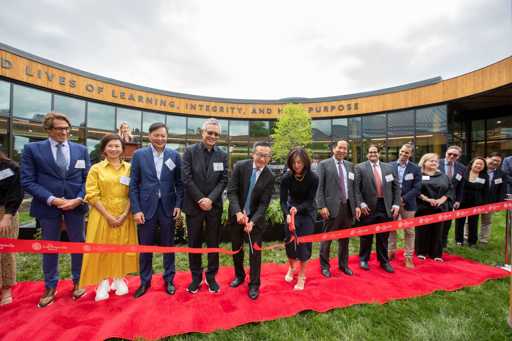 Joe Tsai and Clara Wu Tsai cut the ribbon to open Tsai Field House in May.