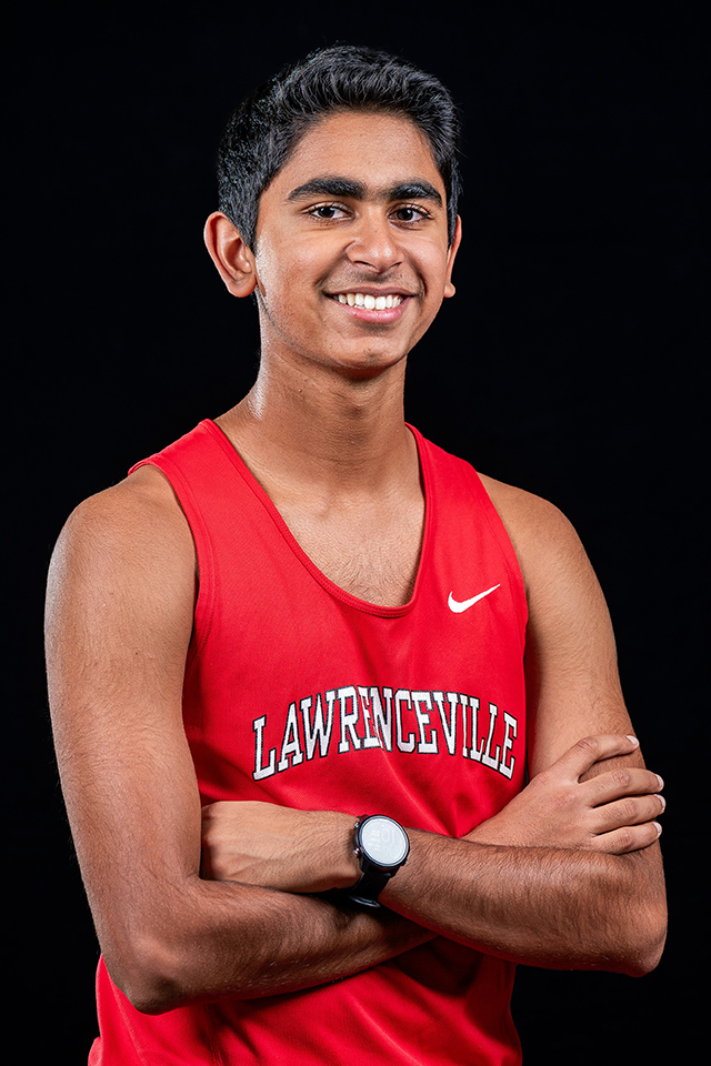 image of Taksh Gupta '25 in his Lawrenceville cross-country uniform.