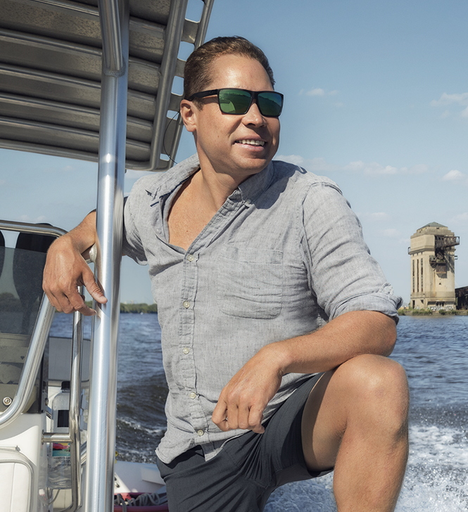 Zack Hoisington '07 speeds along the Delaware Bay in a boat.