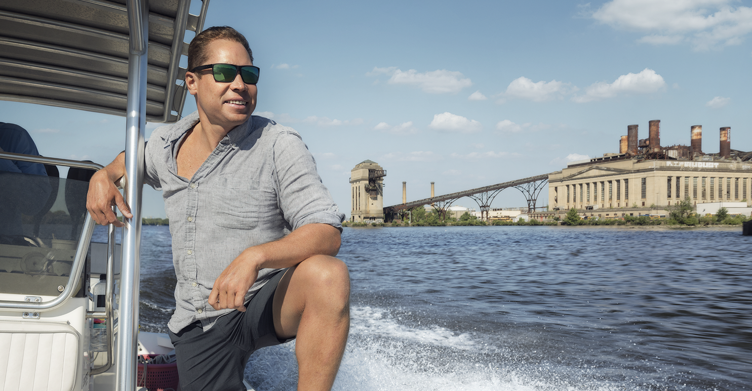 Zack Hoisington '07 speeds along the Delaware Bay in a boat.