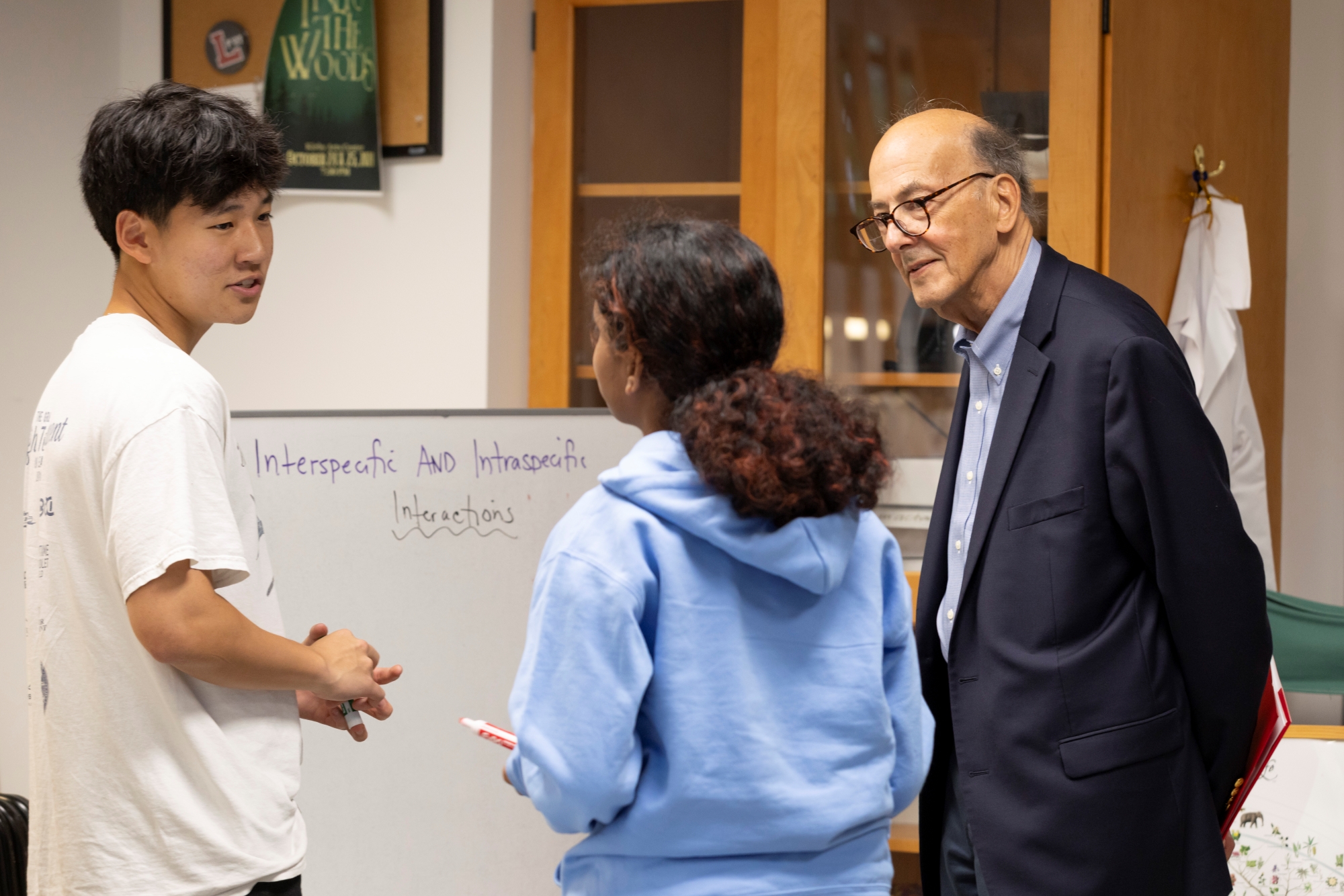 Roger Glass listens to students talk in class during his visit to Lawrenceville in May 2025