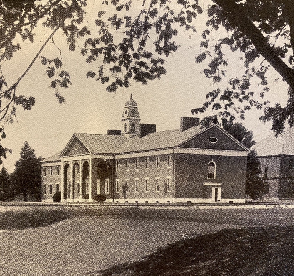 A sepia-toned 1926 photo of Pop Hall taken from a spot where Boys' Lower now stands