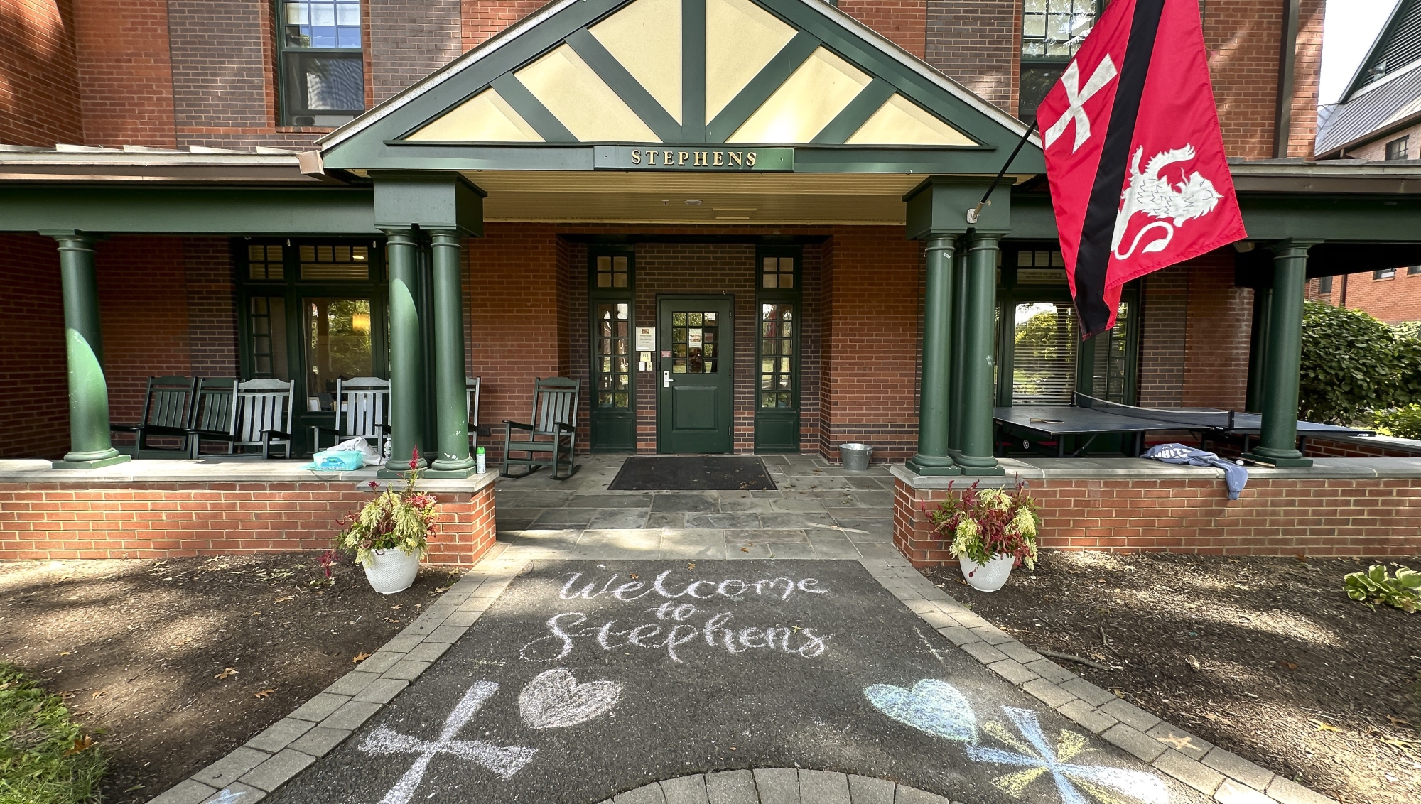 Pastel chalk drawings on the walkway into Stephens House welcome new residents.